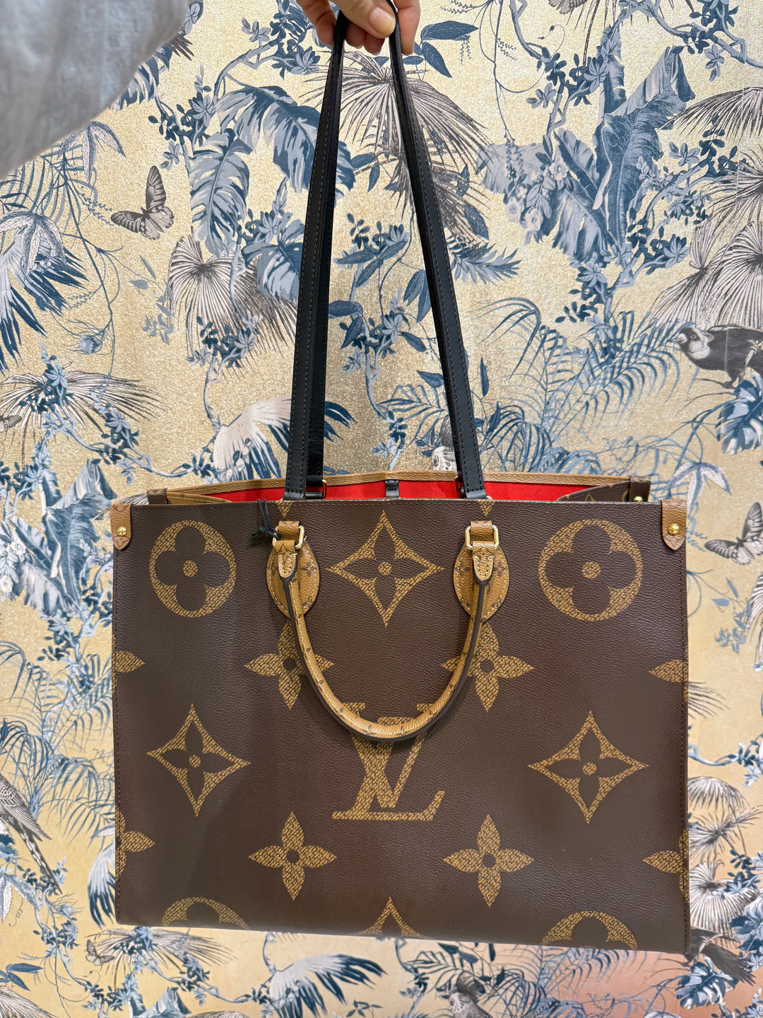 Explore timeless Louis Vuitton pieces such as the {{ product.title